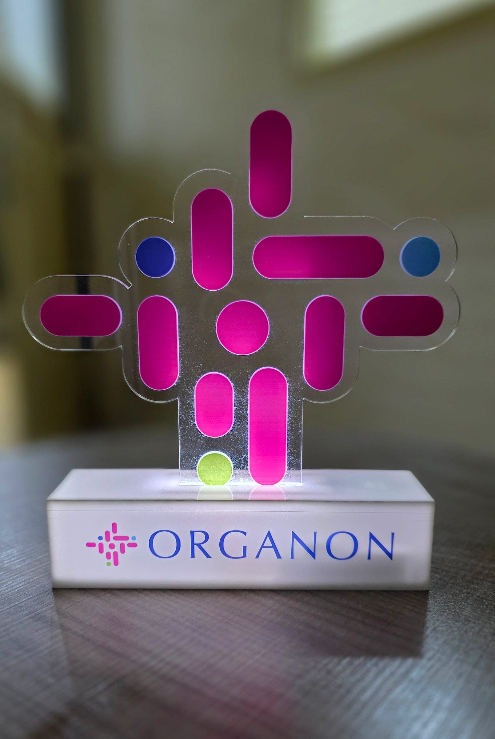 Illuminated acrylic Organon logo table sign